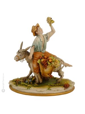 RAGAZZO SU ASINO Statuetta statuina figura porcellana Capodimonte fatto a mano Made in Italy